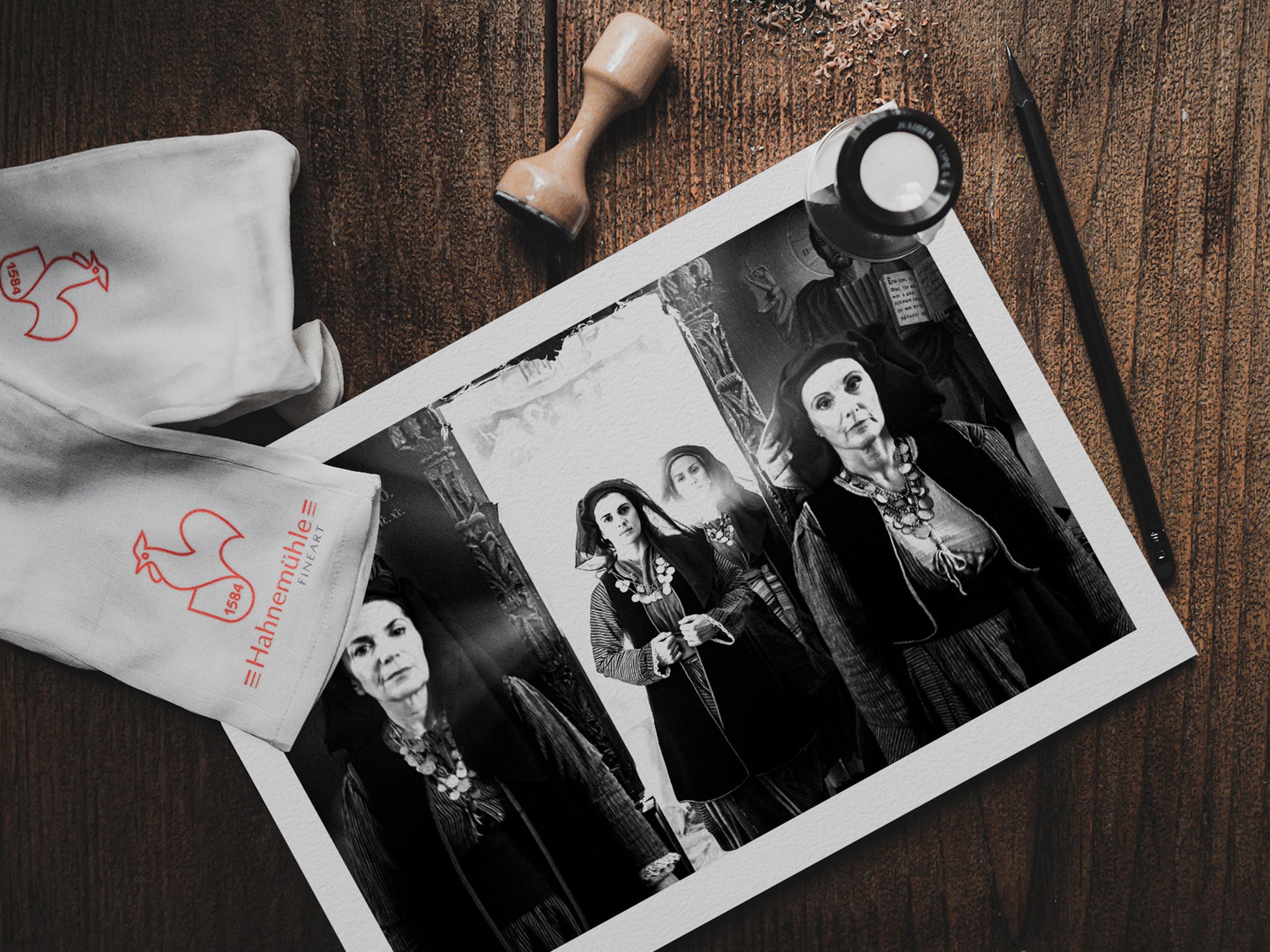 Four women in Alagonia local costumes at the church of the Mandraki Monastery, Alagonia, Peloponnese, Greece. Black and white photography print on table by George Tatakis.