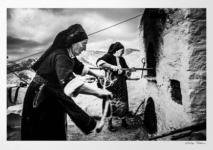 Black and White Photography Wall Art Greece | Women lighting up the wood oven Olympos Karpathos Dodecanese by George Tatakis