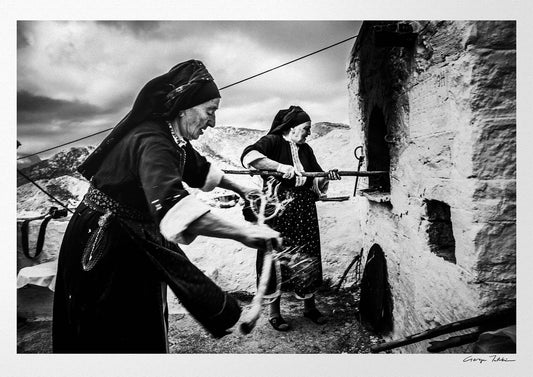 Black and White Photography Wall Art Greece | Women lighting up the wood oven Olympos Karpathos Dodecanese by George Tatakis