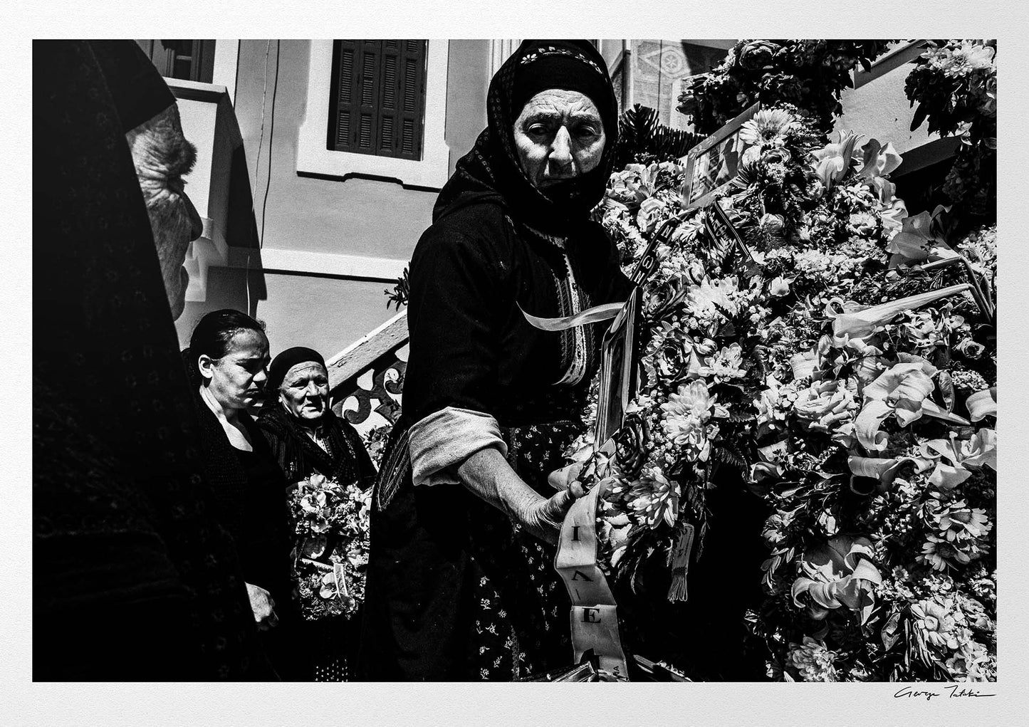 Black and White Photography Wall Art Greece | Woman preparing the Epitaph in her traditional costume Olympos Karpathos Dodecanese by George Tatakis