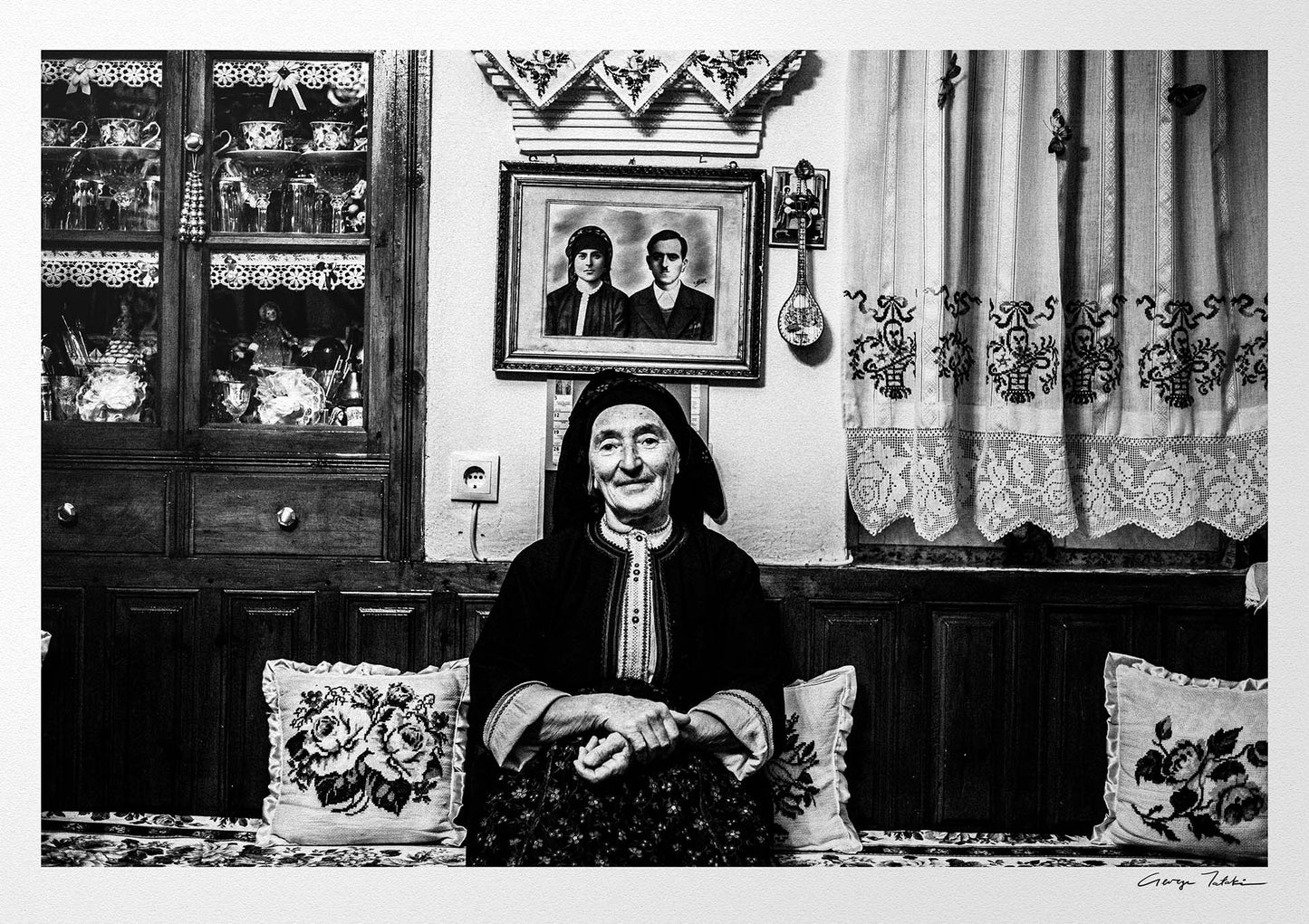 Black and White Photography Wall Art Greece | Woman in a traditional house Olympos Karpathos Dodecanese by George Tatakis