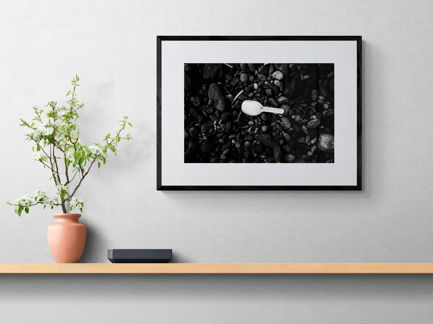 Black Pebbles and Shovel | Santorini | Chorōs | Black-and-white wall art photography from Greece