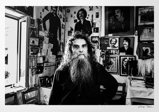 Black and White Photography Wall Art Greece | Antonis Xylouris (Psarantonis) in his brother’s house Anogia Crete by George Tatakis