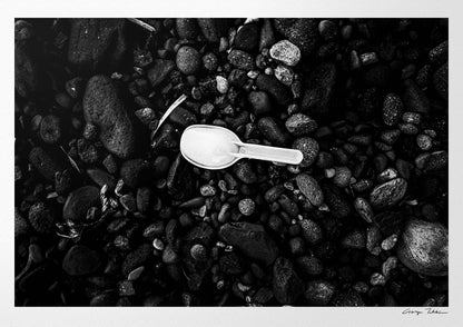 Black Pebbles and Shovel | Santorini | Chorōs | Black-and-white wall art photography from Greece
