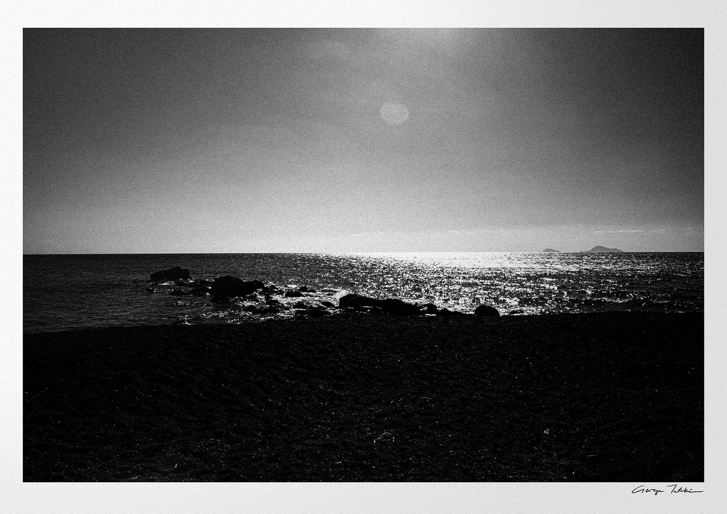Calm Sunlit Sea | Santorini | Chorōs | Black-and-white wall art photography from Greece