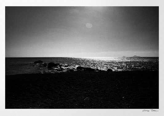 Calm Sunlit Sea | Santorini | Chorōs | Black-and-white wall art photography from Greece