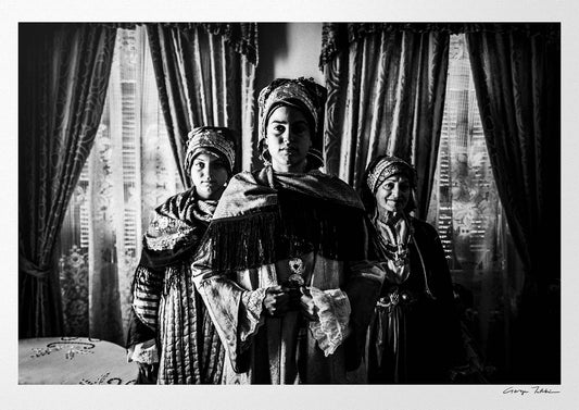 Black and White Photography Wall Art Greece | Three ladies in the traditional costumes of Symi island inside a house Dodecanese Greece by George Tatakis