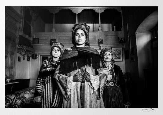 Black and White Photography Wall Art Greece | Three ladies in the traditional costumes of Symi island inside a house Dodecanese Greece by George Tatakis