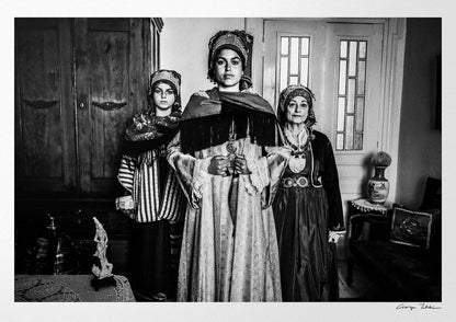Black and White Photography Wall Art Greece | Three ladies in the traditional costumes of Symi island inside a house Dodecanese Greece by George Tatakis