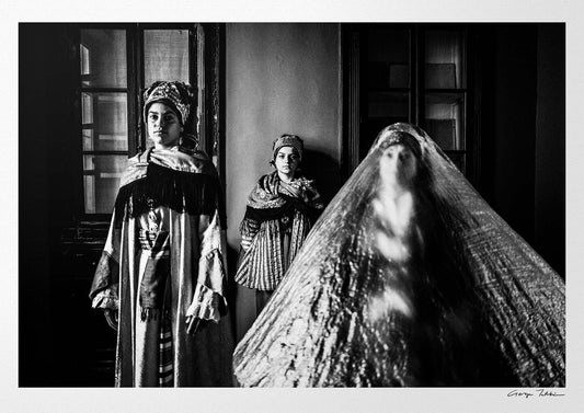 Black and White Photography Wall Art Greece | Three ladies in the traditional costumes of Symi island inside a room Dodecanese Greece by George Tatakis