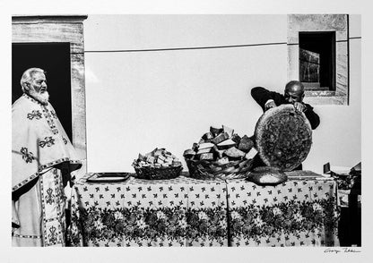 Black and White Photography Wall Art Greece | Cutting bread during a feast in Tristomo Olympos Karpathos Dodecanese by George Tatakis