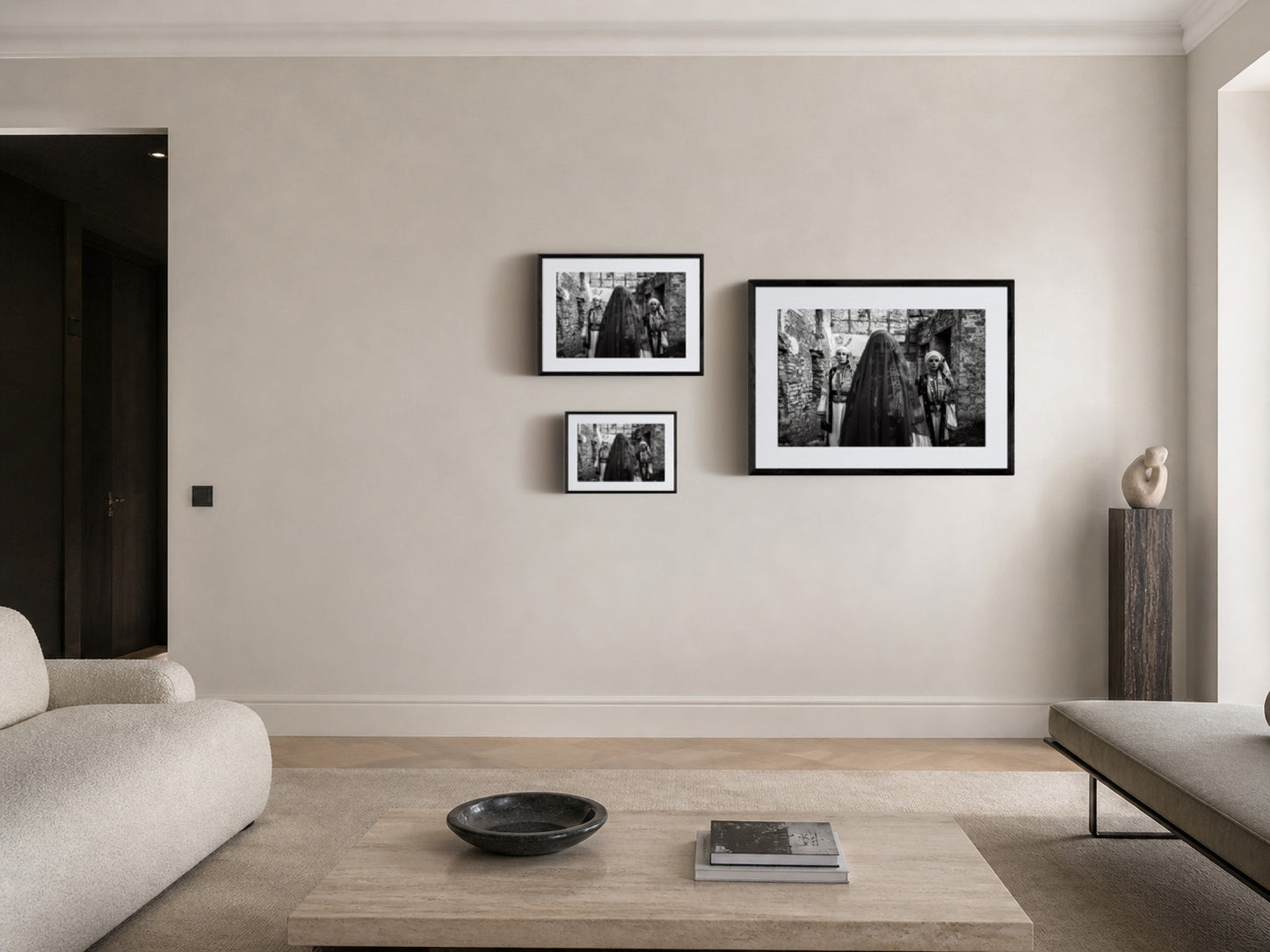 Three women in traditional attire standing in stone-walled ruins. Kyparissia, Peloponnese, Greece. Black and white photography frame sizes by George Tatakis.