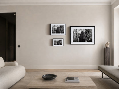 Three women in traditional attire standing in stone-walled ruins. Kyparissia, Peloponnese, Greece. Black and white photography frame sizes by George Tatakis.