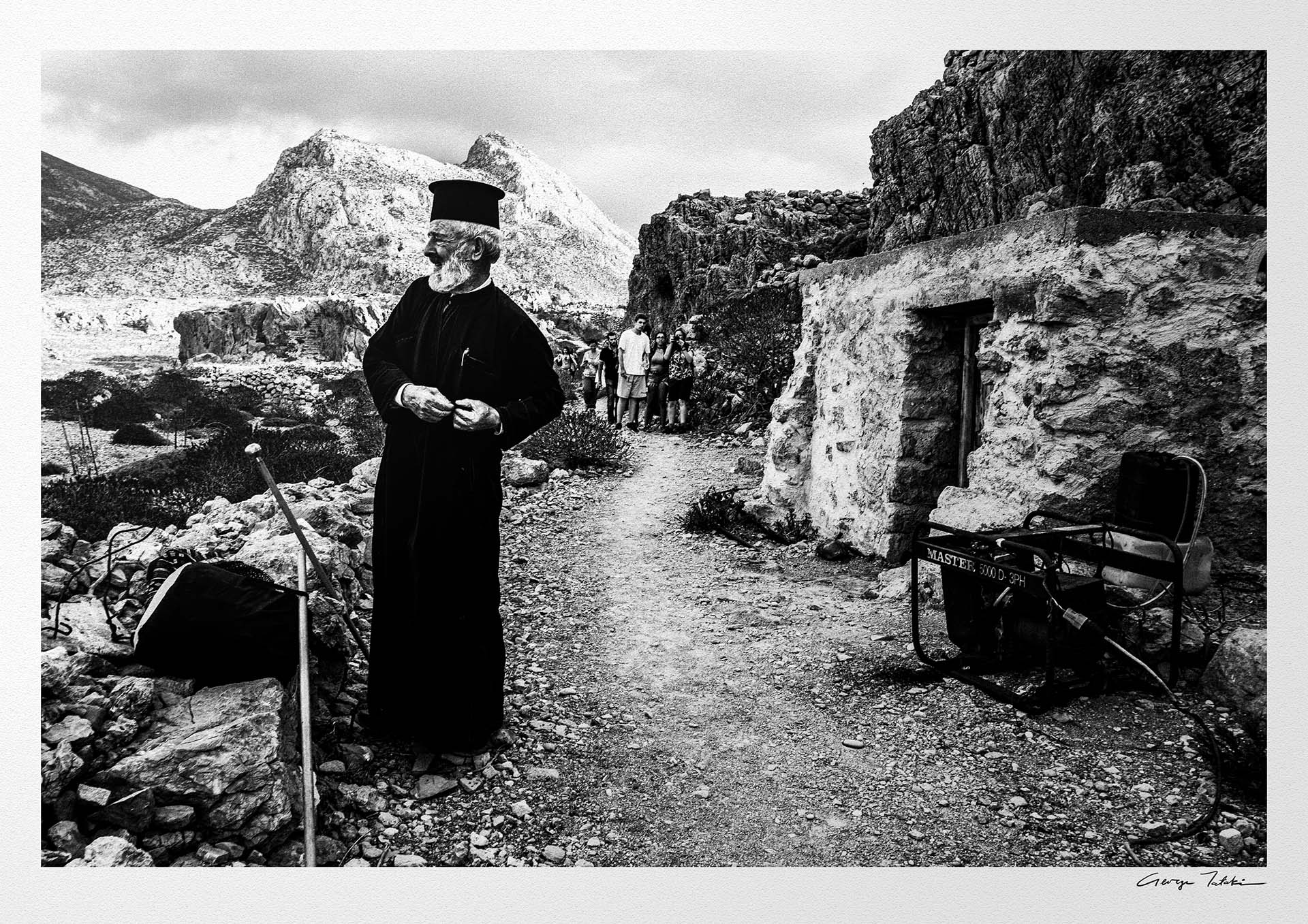 Black and White Photography Wall Art Greece | Priest at the St. John celebration in Vrykounta Olympos Karpathos Dodecanese by George Tatakis