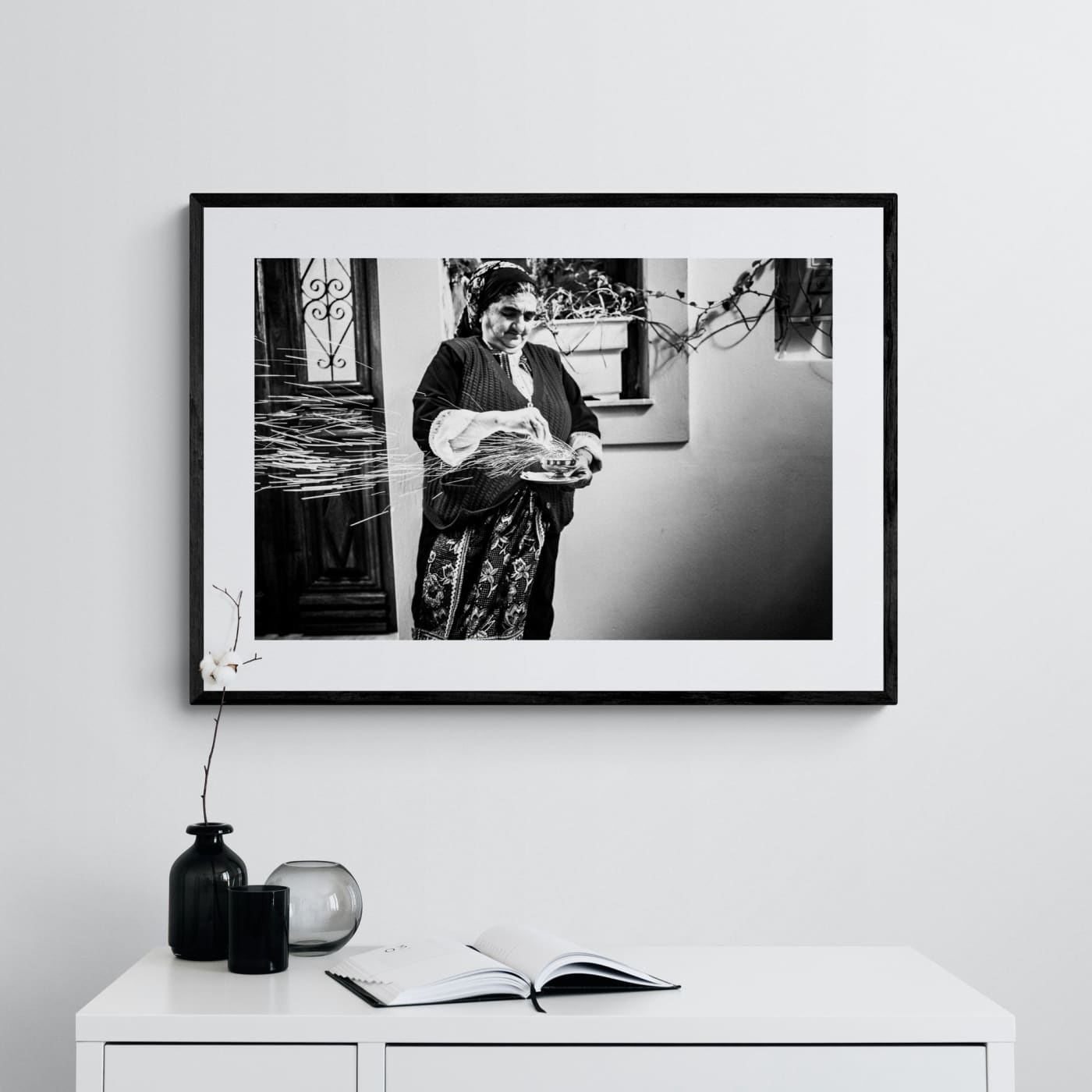 Black and White Photography Wall Art Greece | Woman with sparks during the Litany of Epitaphios Olympos Karpathos Dodecanese by George Tatakis - single framed photo